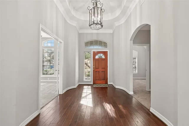 a view of entryway with wooden floor