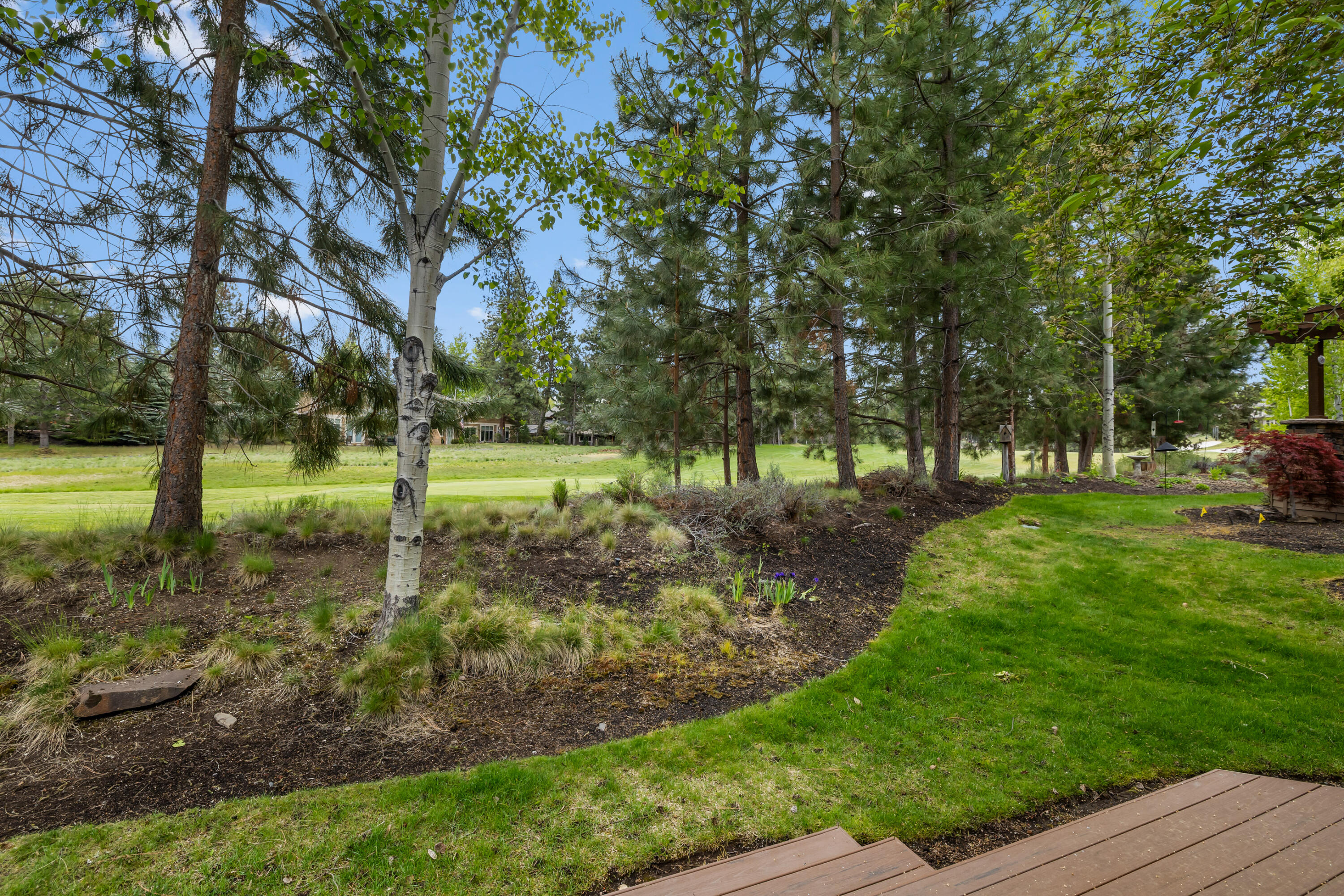19571 Southwest Simpson Avenue Bend, OR 97702 - Photo 36 of 45 Parklike setting along the fairway