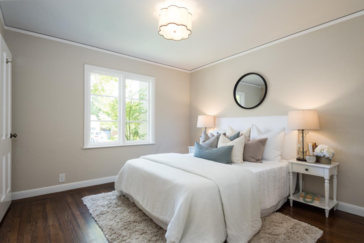 1000 Harvard Road San Mateo, CA 94402 - Photo 16 of 32 a bedroom with bed and a window