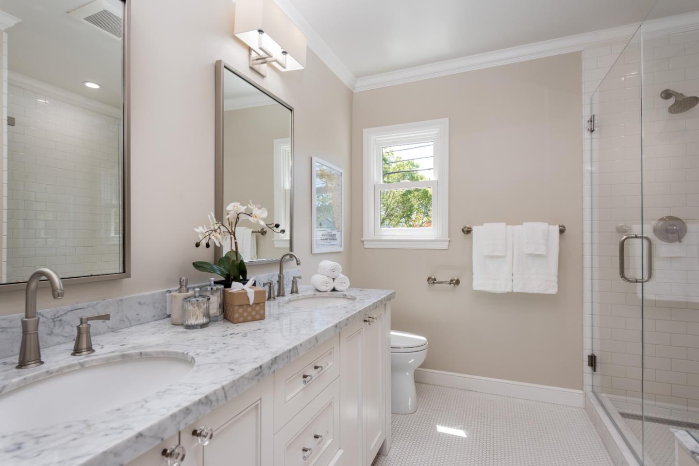 1000 Harvard Road San Mateo, CA 94402 - Photo 25 of 32 a bathroom with a double vanity sink toilet and shower