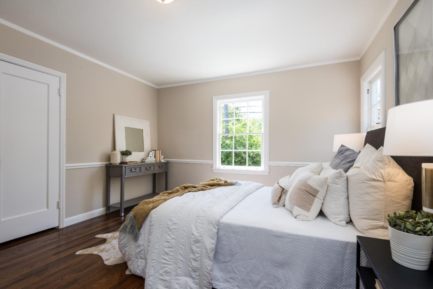 1000 Harvard Road San Mateo, CA 94402 - Photo 26 of 32 a bedroom with a bed table chair and a window