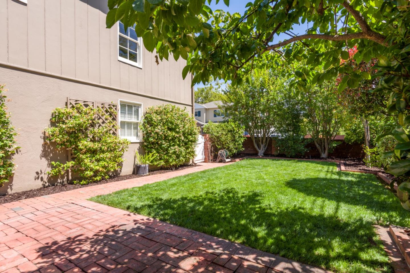 1000 Harvard Road San Mateo, CA 94402 - Photo 29 of 32 a view of a back yard of the house
