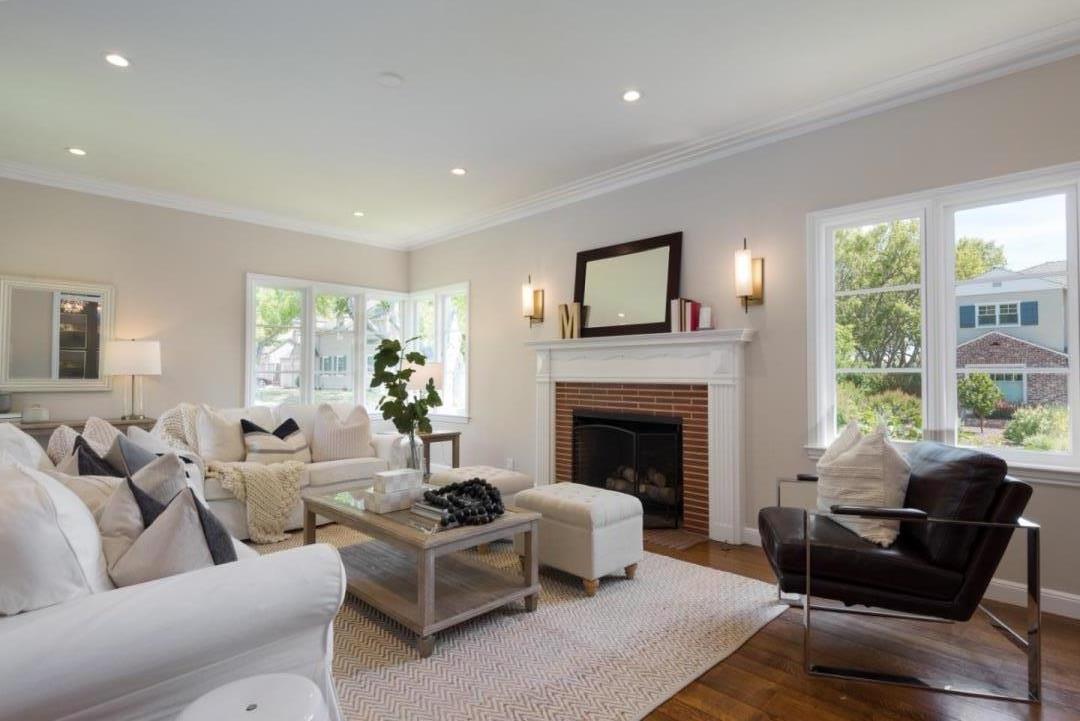 1000 Harvard Road San Mateo, CA 94402 - Photo 5 of 32 a living room with furniture and a fireplace