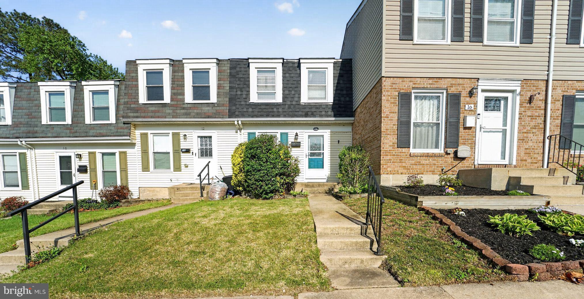 14 Pickens Court Baltimore, MD 21236 - Photo 1 of 30 a front view of a house with a yard