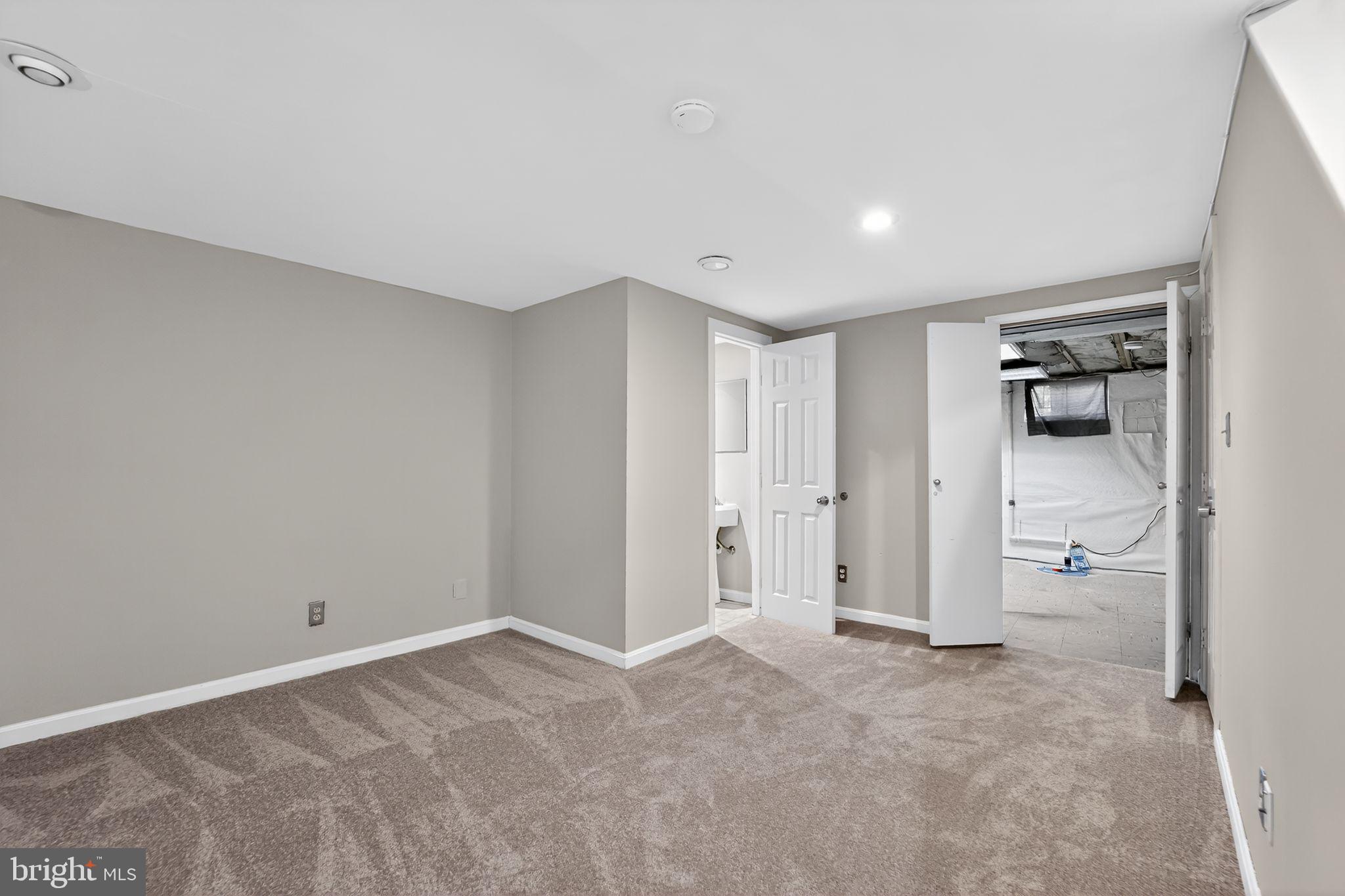14 Pickens Court Baltimore, MD 21236 - Photo 22 of 30 a view of a livingroom and a bathroom