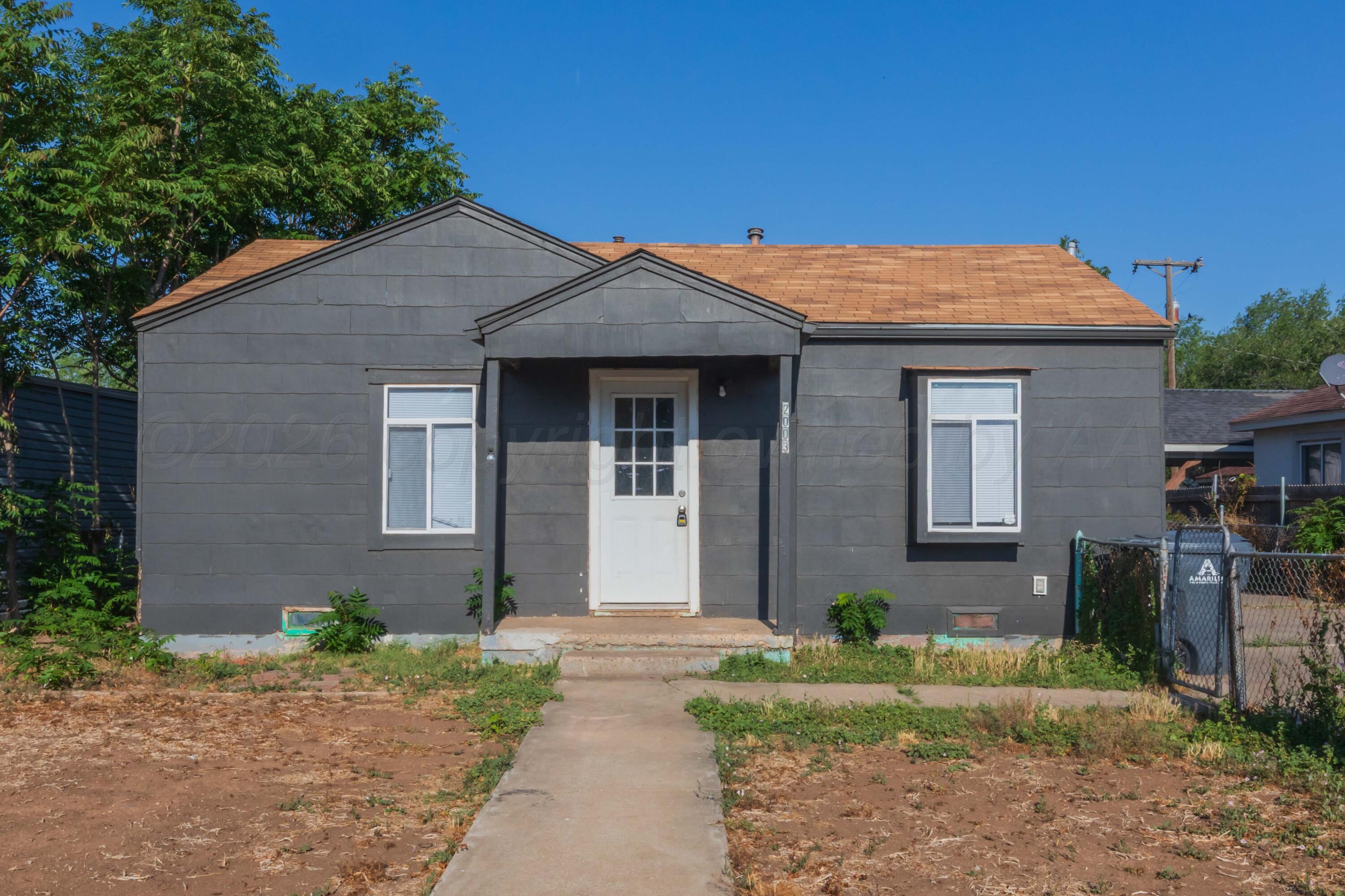 2003 North Spring Street Amarillo, TX 79107 - Photo 21 of 21 a front view of a house with garden