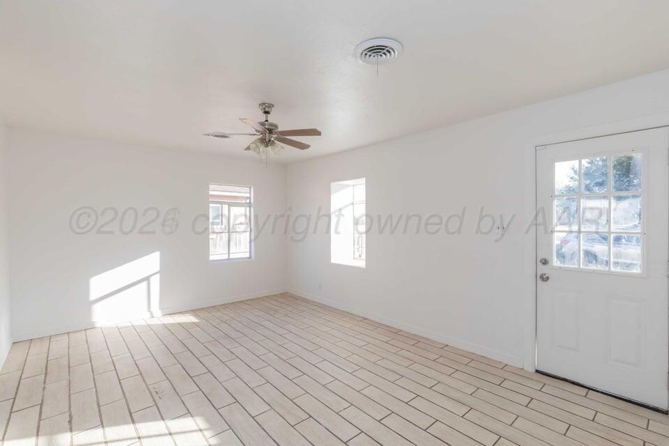 2003 North Spring Street Amarillo, TX 79107 - Photo 5 of 21 a view of an empty room with a window
