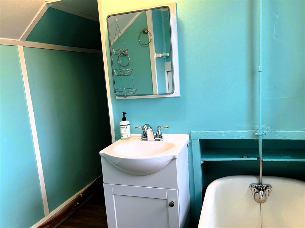66 Maple Street, Unit 3 Boston, MA 02136 - Photo 11 of 14 a bathroom with a sink and toilet