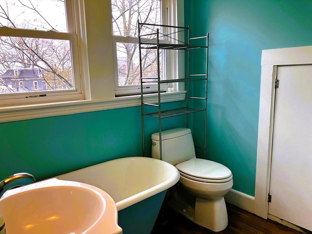 66 Maple Street, Unit 3 Boston, MA 02136 - Photo 12 of 14 a bathroom with a toilet and a sink