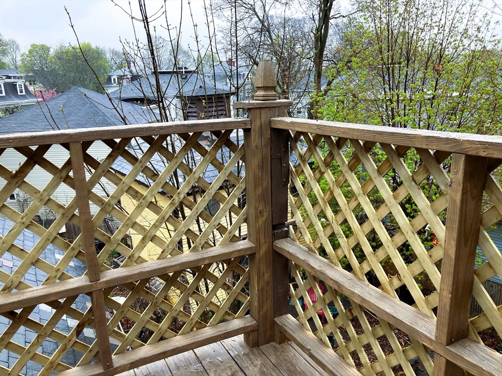 66 Maple Street, Unit 3 Boston, MA 02136 - Photo 13 of 14 a view of wooden balcony