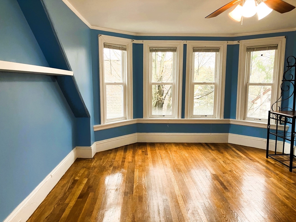 66 Maple Street, Unit 3 Boston, MA 02136 - Photo 2 of 14 a view of a room with a large window