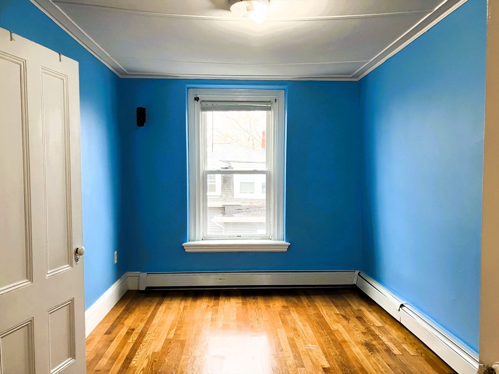 66 Maple Street, Unit 3 Boston, MA 02136 - Photo 6 of 14 a view of a room with a window