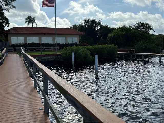 a sign board with a yard