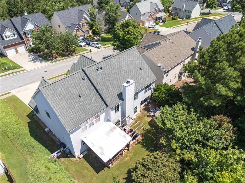 665 Roxford Lane Northeast Buford, GA 30518 - Photo 16 of 19 an aerial view of residential houses with outdoor space