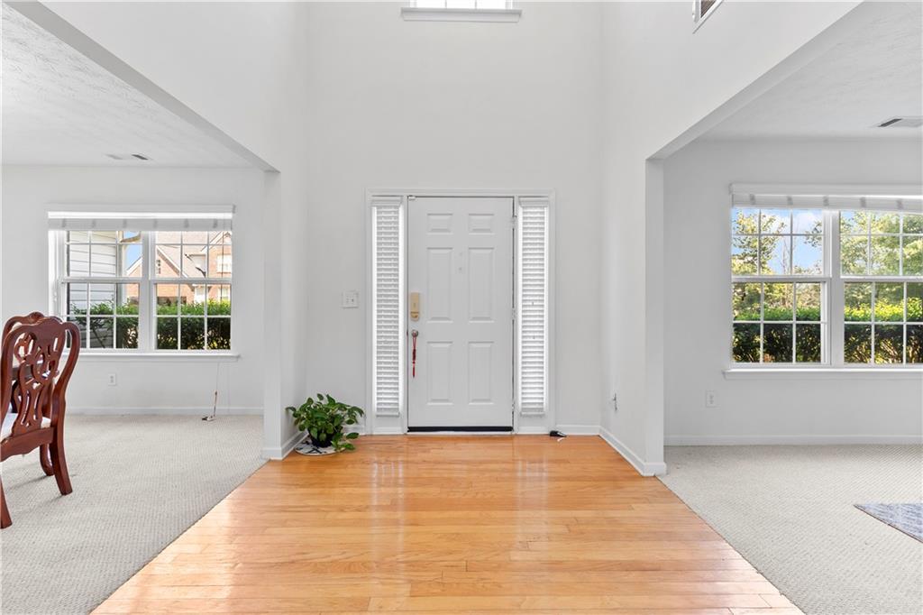 665 Roxford Lane Northeast Buford, GA 30518 - Photo 2 of 19 a view of an empty room with a window
