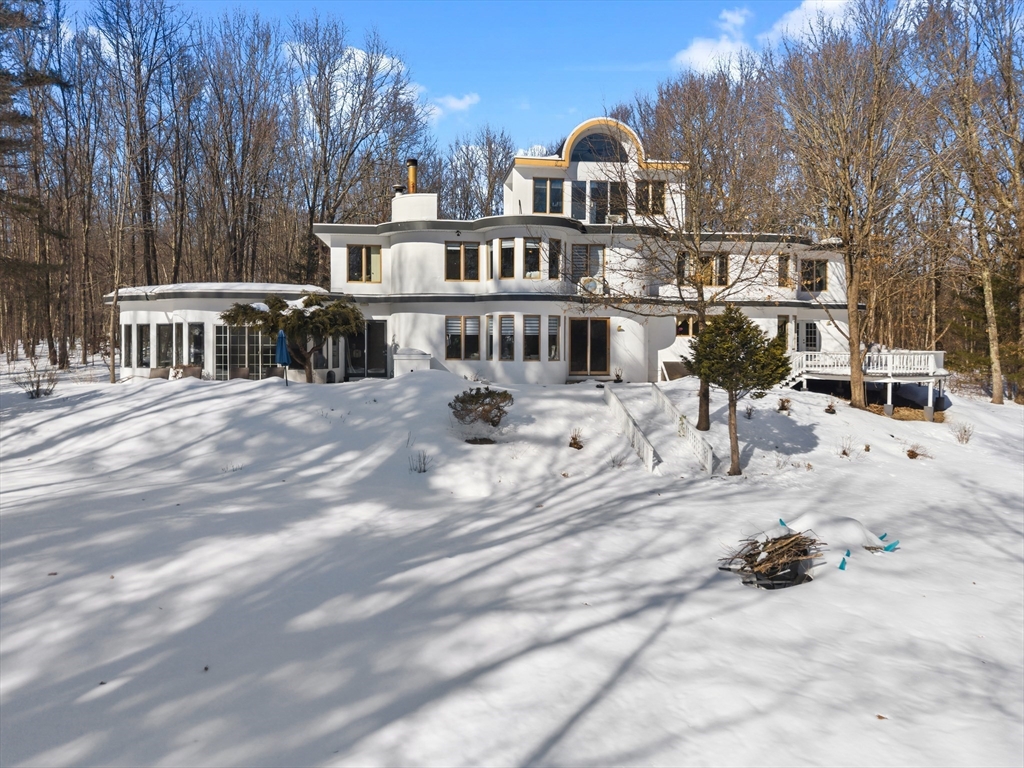 95 Ramshorn Road Dudley, MA 01571 - Photo 1 of 42 a view of a house with snow board