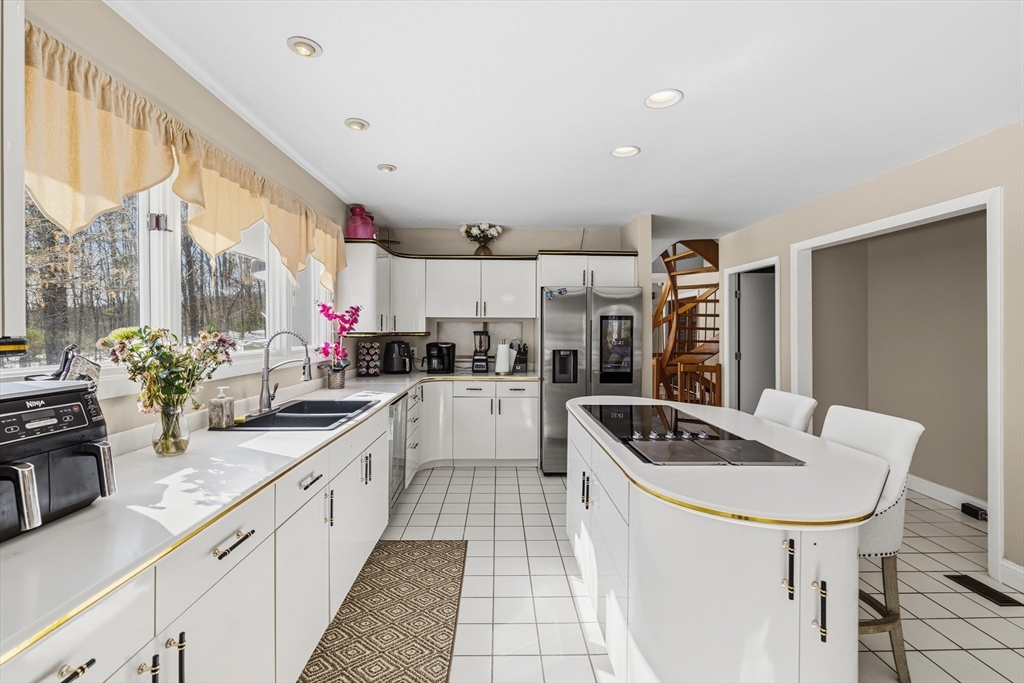 95 Ramshorn Road Dudley, MA 01571 - Photo 12 of 42 a kitchen with sink cabinets and stove