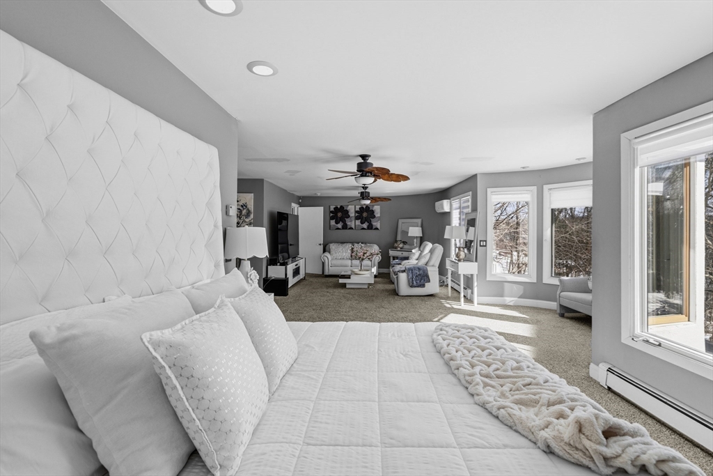 95 Ramshorn Road Dudley, MA 01571 - Photo 23 of 42 a living room with furniture and a large window