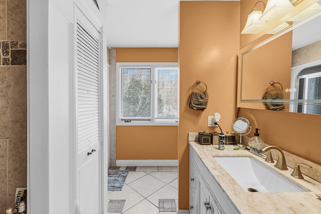 95 Ramshorn Road Dudley, MA 01571 - Photo 25 of 42 a bathroom with a tub sink and mirror