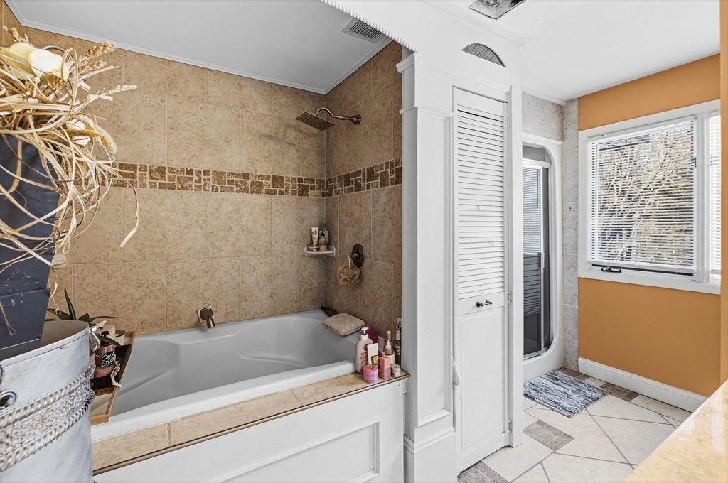 95 Ramshorn Road Dudley, MA 01571 - Photo 26 of 42 a bathroom with a tub and shower