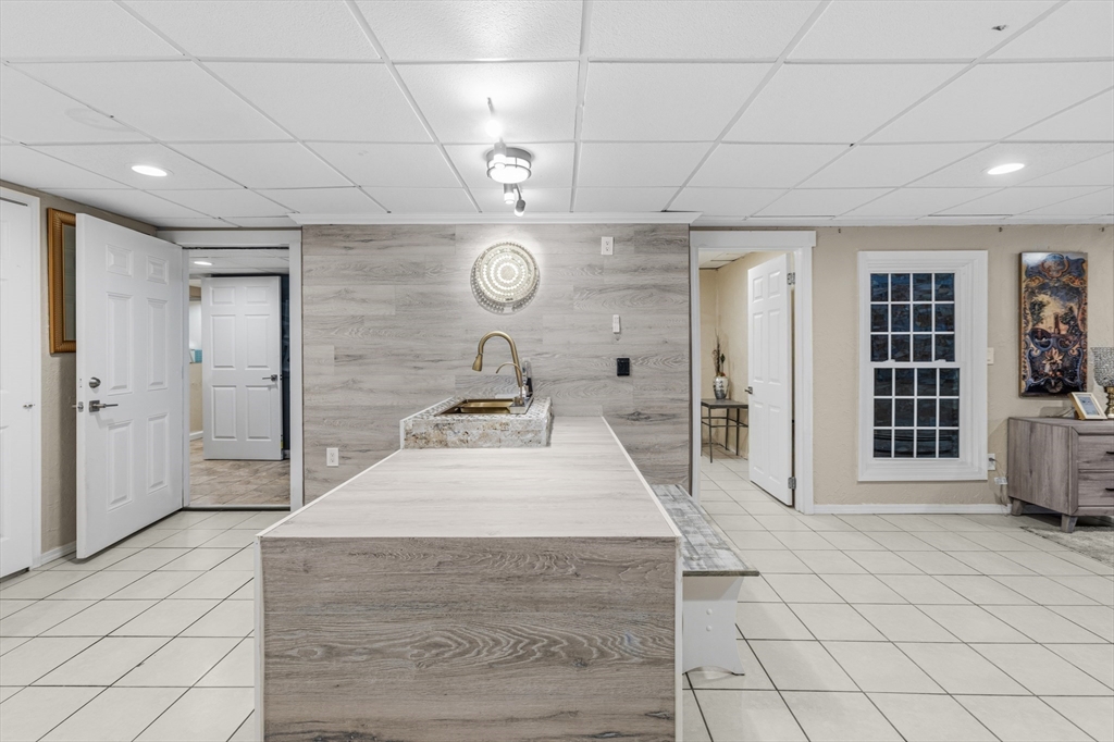 95 Ramshorn Road Dudley, MA 01571 - Photo 35 of 42 a very nice looking room with a large mirror and furniture