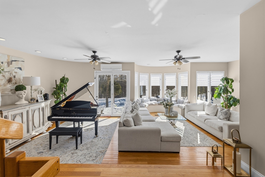 95 Ramshorn Road Dudley, MA 01571 - Photo 5 of 42 a living room with furniture and a wooden floor