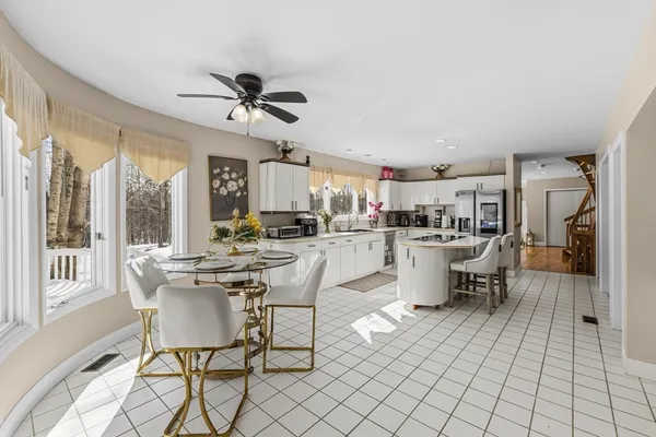 a kitchen with a stove a sink and a refrigerator