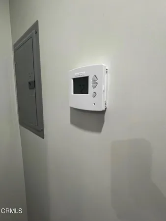 a view of a car park in front of house