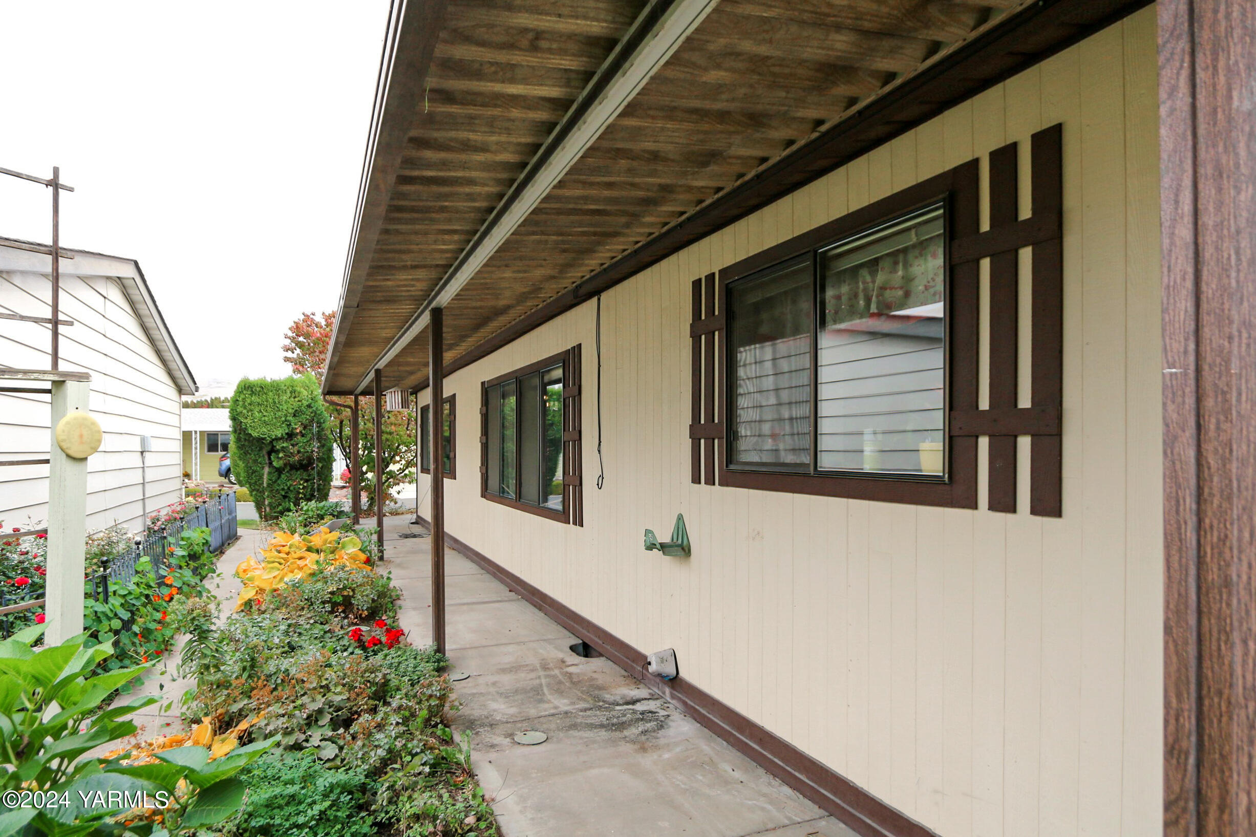 3701 Gun Club Road, Unit 28 Yakima, WA 98901 - Photo 26 of 28 a view of a house with a small yard