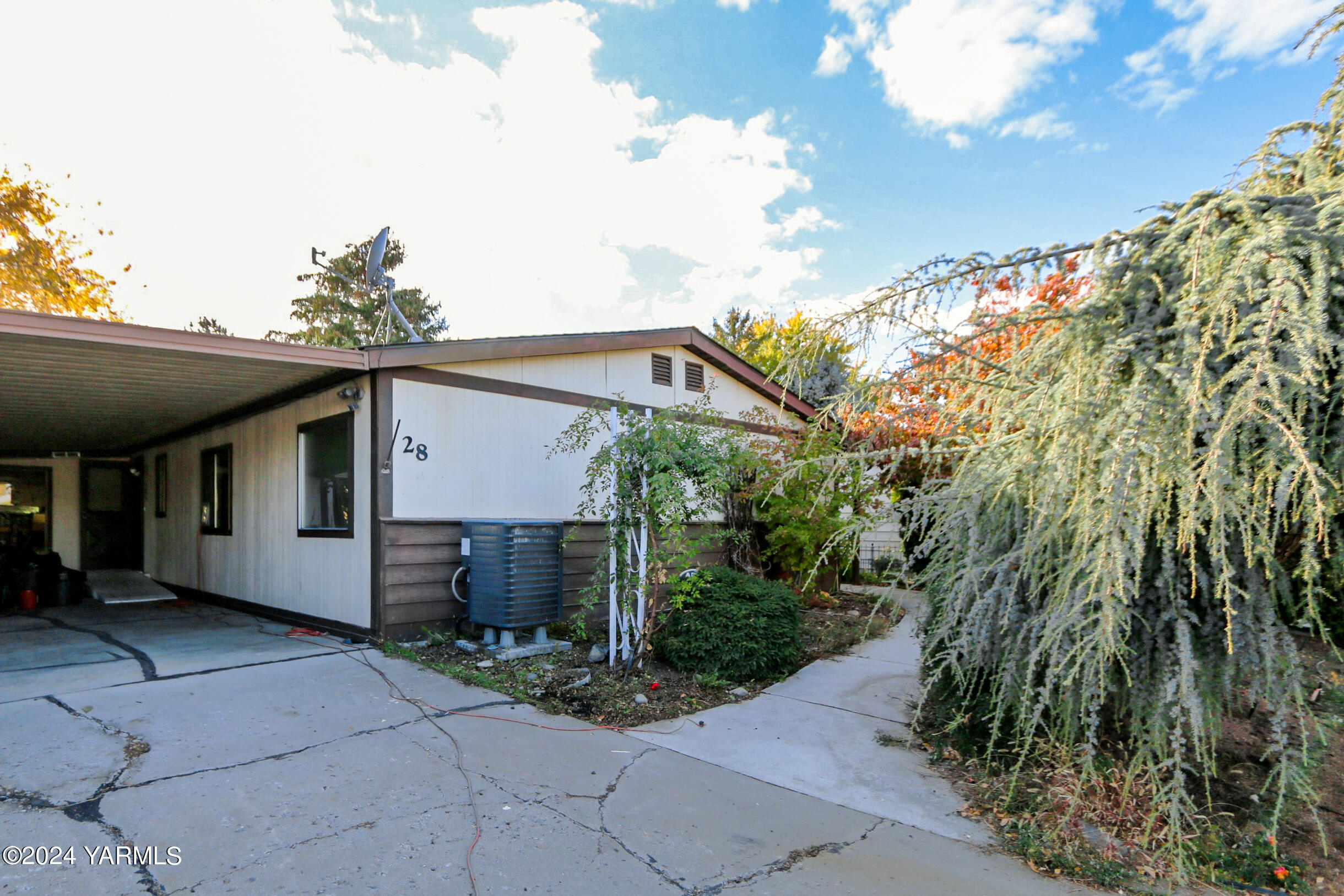3701 Gun Club Road, Unit 28 Yakima, WA 98901 - Photo 27 of 28 a view of a house with a yard