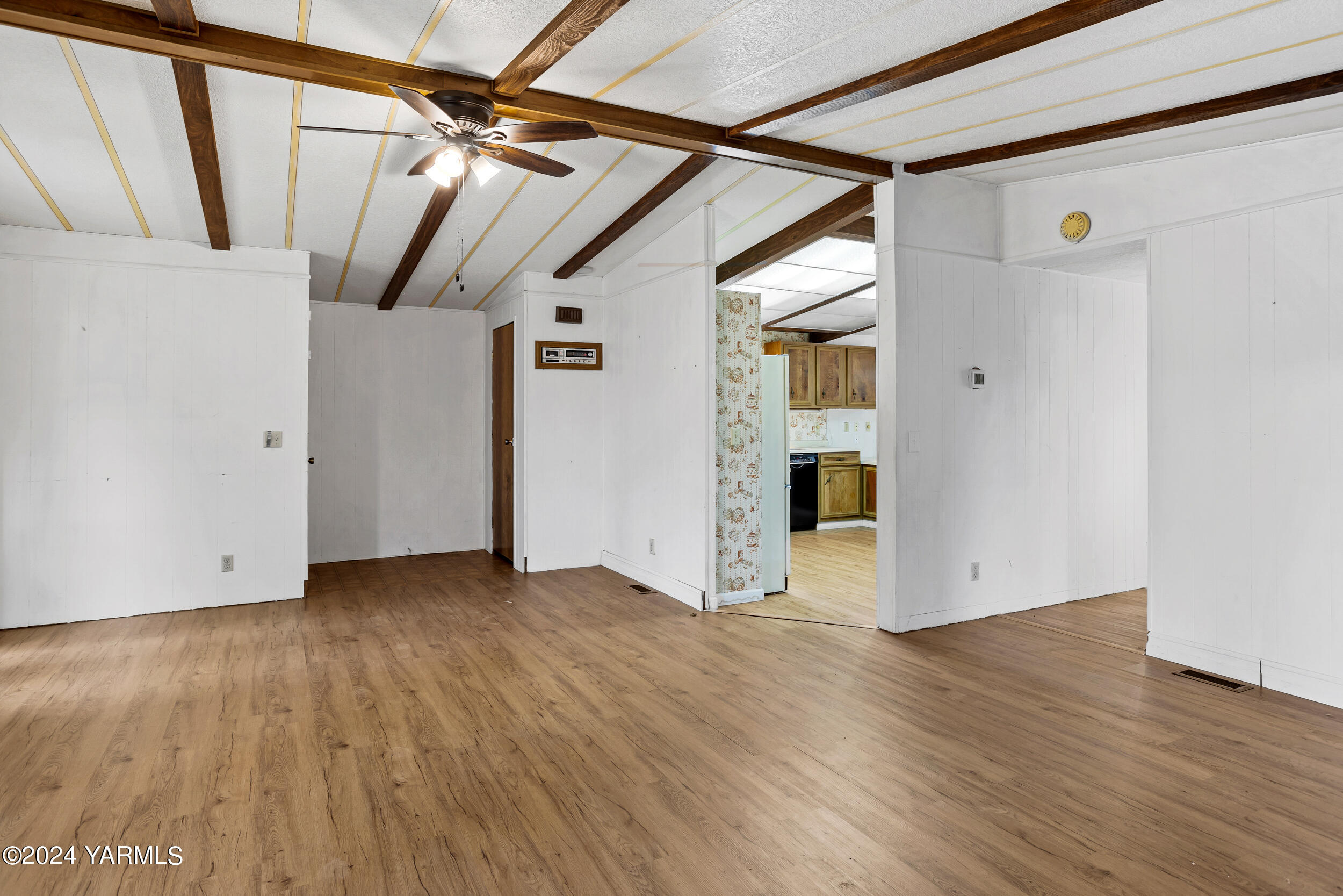 3701 Gun Club Road, Unit 28 Yakima, WA 98901 - Photo 7 of 28 a view of a big room with wooden floor and windows
