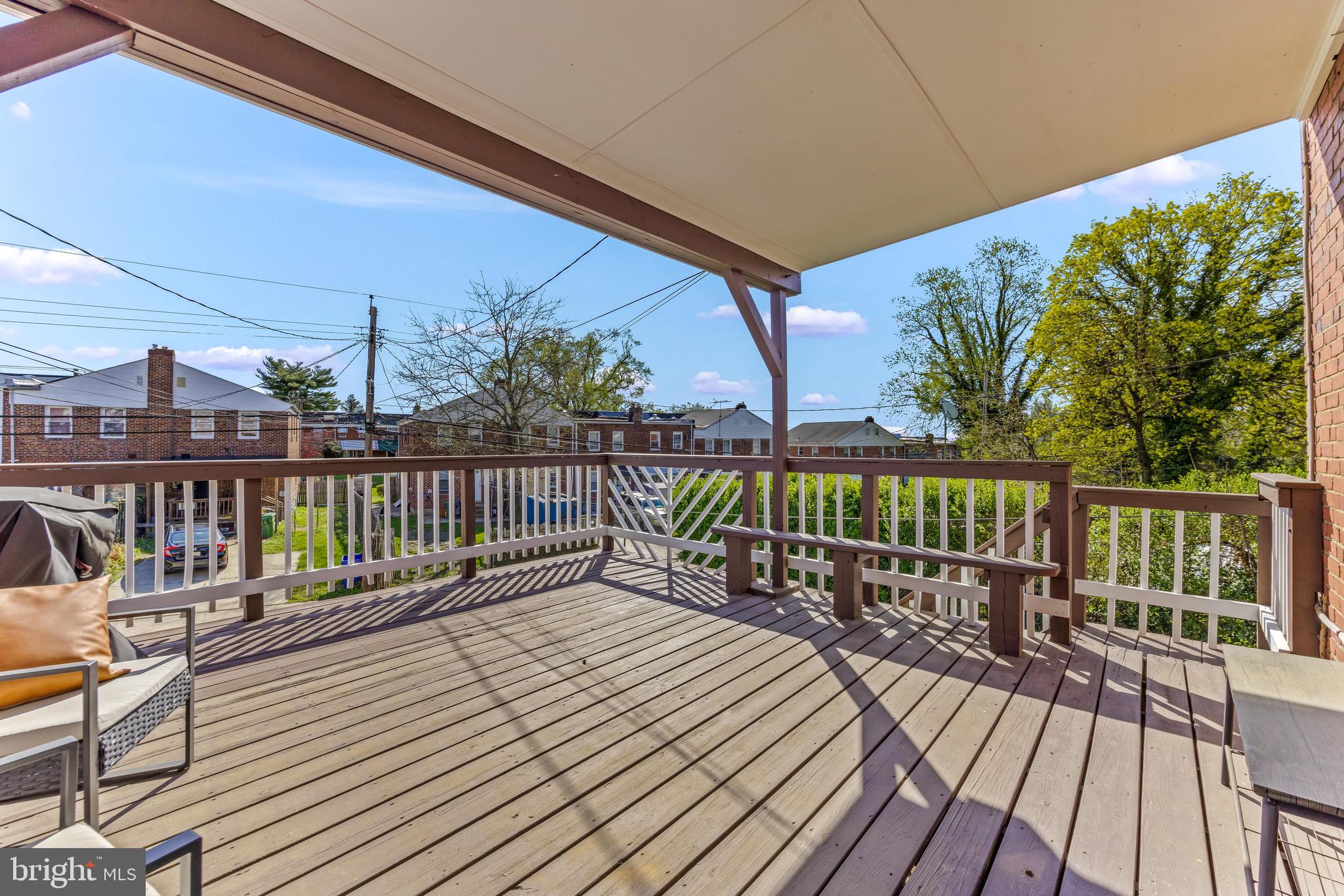 57 Upmanor Road Baltimore, MD 21229 - Photo 23 of 27 a balcony with wooden floor