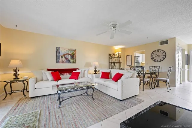 a living room with furniture and a couch