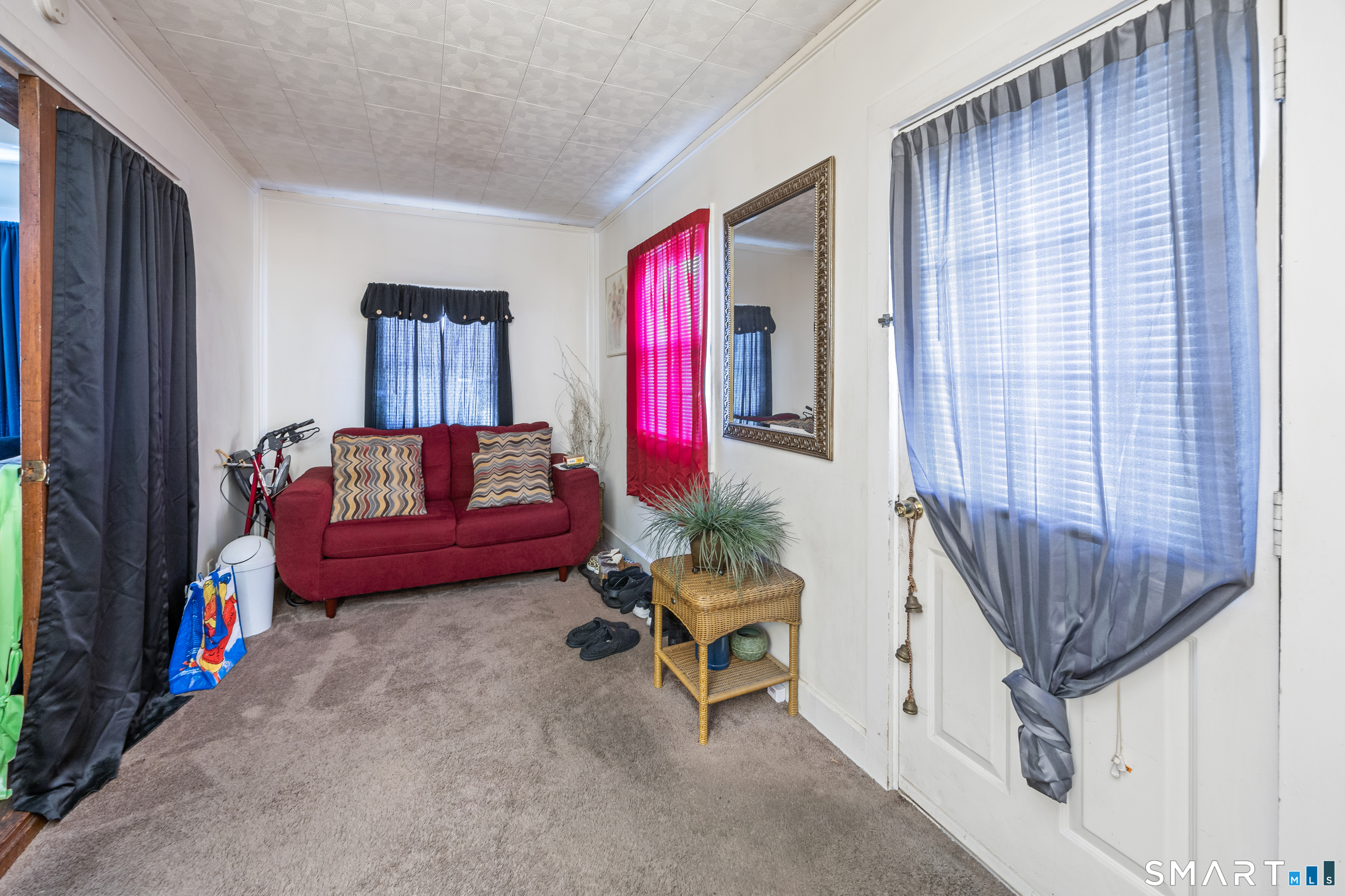105 Greene Street Bristol, CT 06010 - Photo 22 of 39 a living room with furniture and a window