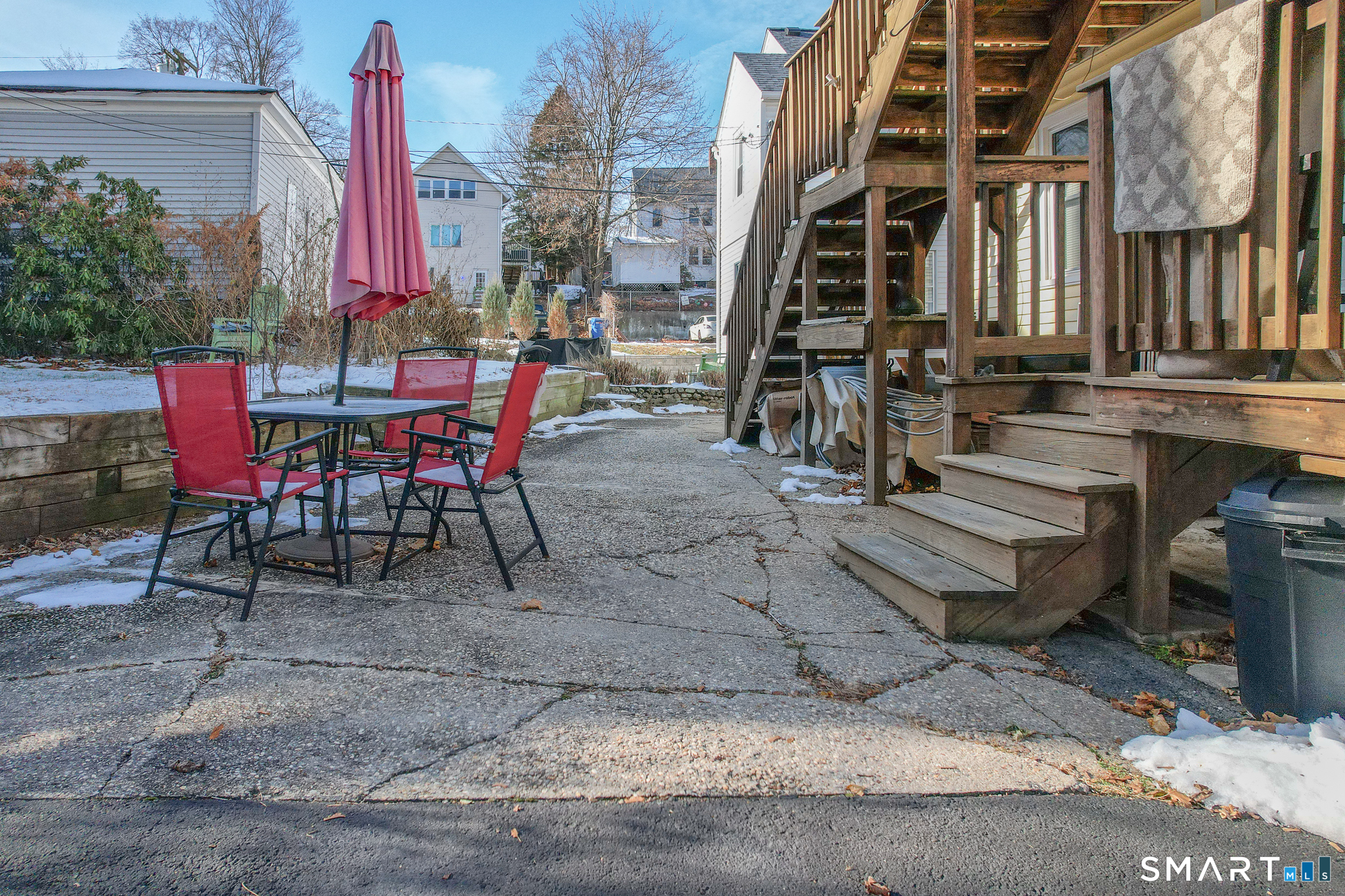 105 Greene Street Bristol, CT 06010 - Photo 37 of 39 a view of a dinning tables and chairs in the patio
