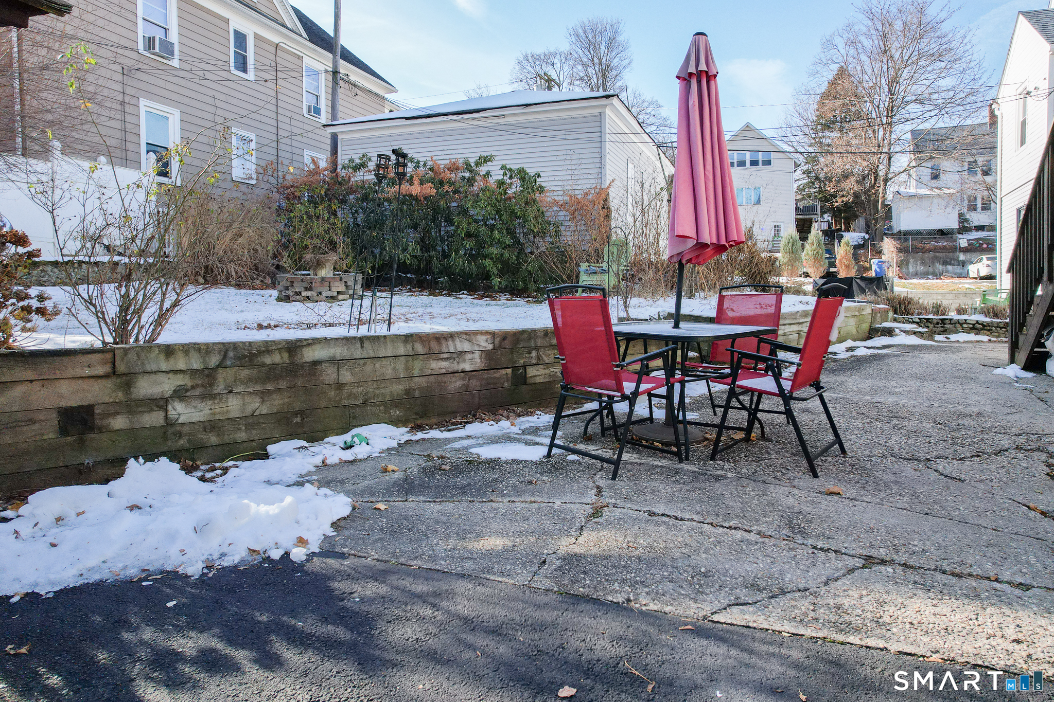 105 Greene Street Bristol, CT 06010 - Photo 38 of 39 a view of a lake with a table and chairs