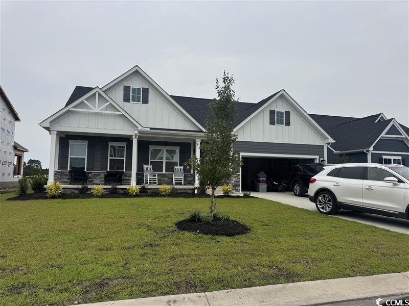 7068 Denim Loop Myrtle Beach, SC 29579 - Photo 1 of 1 Craftsman inspired home with board and batten sidi