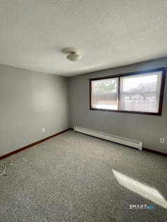1370 Highland Avenue, Unit 5 Waterbury, CT 06708 - Photo 9 of 15 an empty room with windows