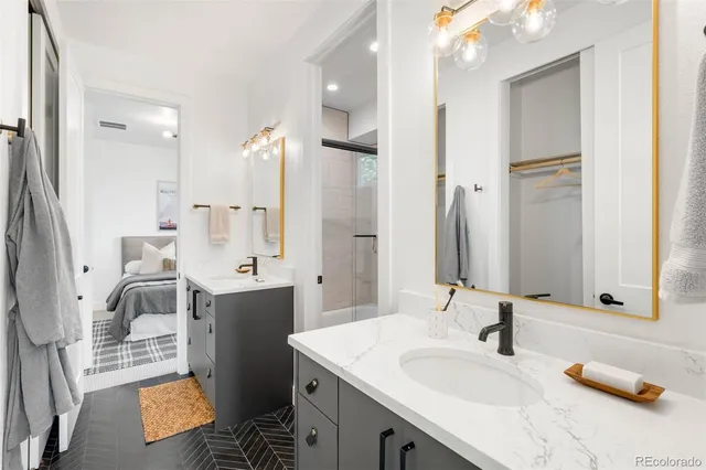 a bathroom with a tub and a shower