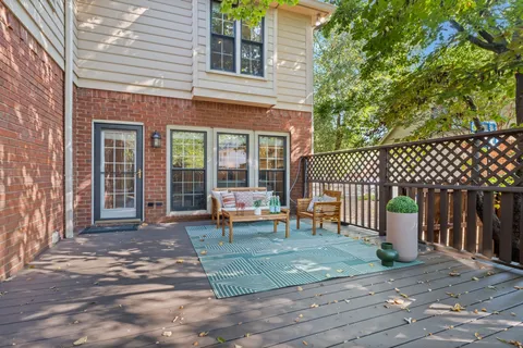 a view of a house with a bench