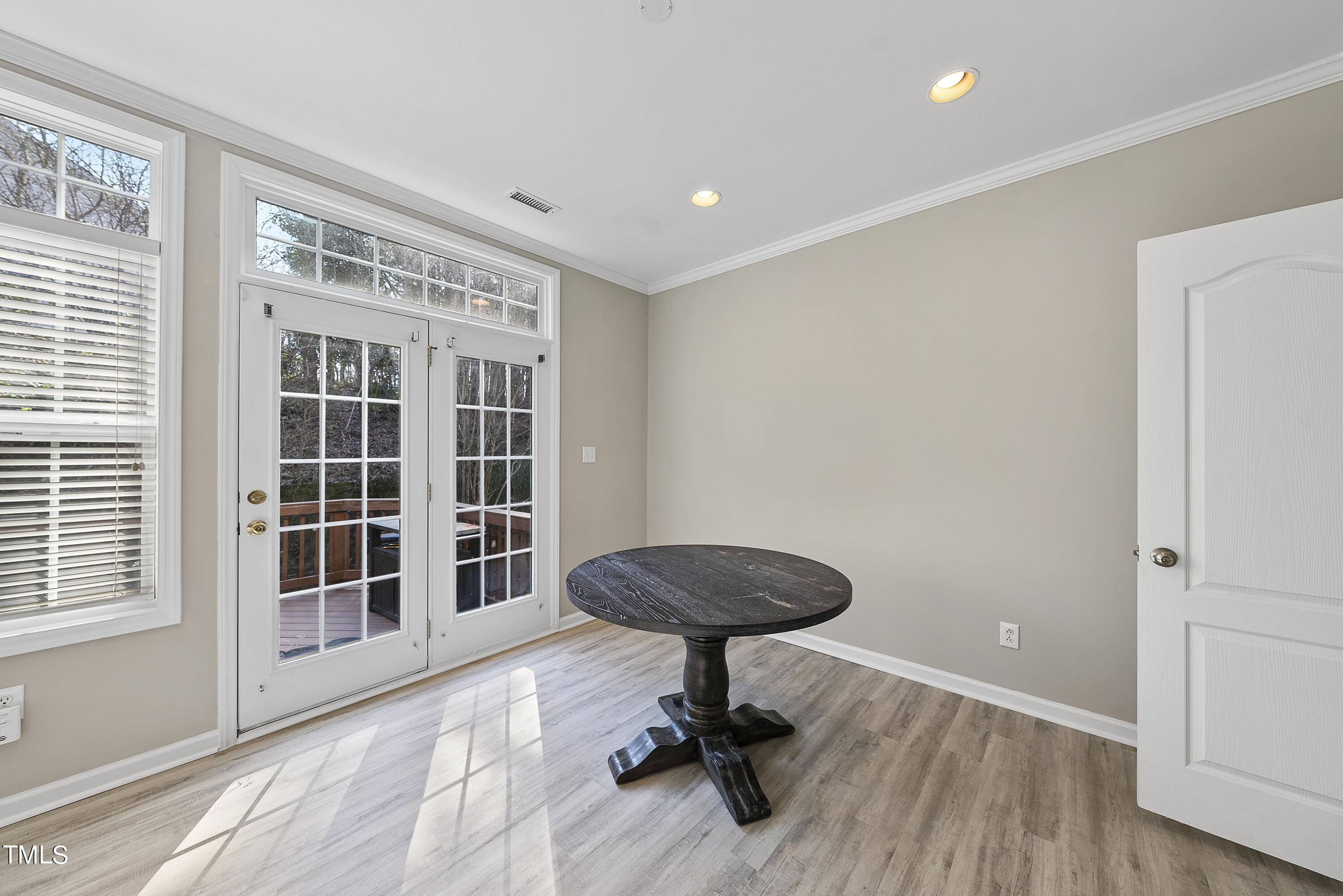 6926 Middleboro Drive Raleigh, NC 27612 - Photo 13 of 29 a view of workspace with windows