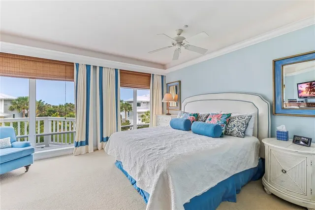 a bathroom with a sink a toilet and a large mirror