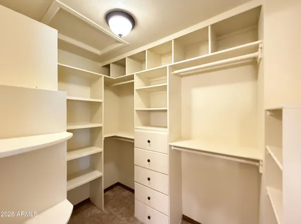 a view of an empty walk in closet