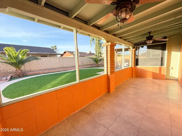 a floor to ceiling window with an outdoor space