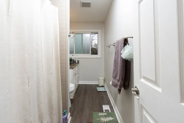 a view of hallway with walk in closet