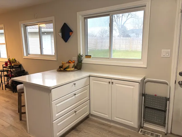 a view of a window and a kitchen