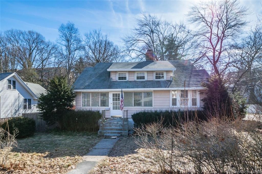 55 Delaware Avenue Waterbury, CT 06708 - Photo 1 of 1 a front view of a house with a yard