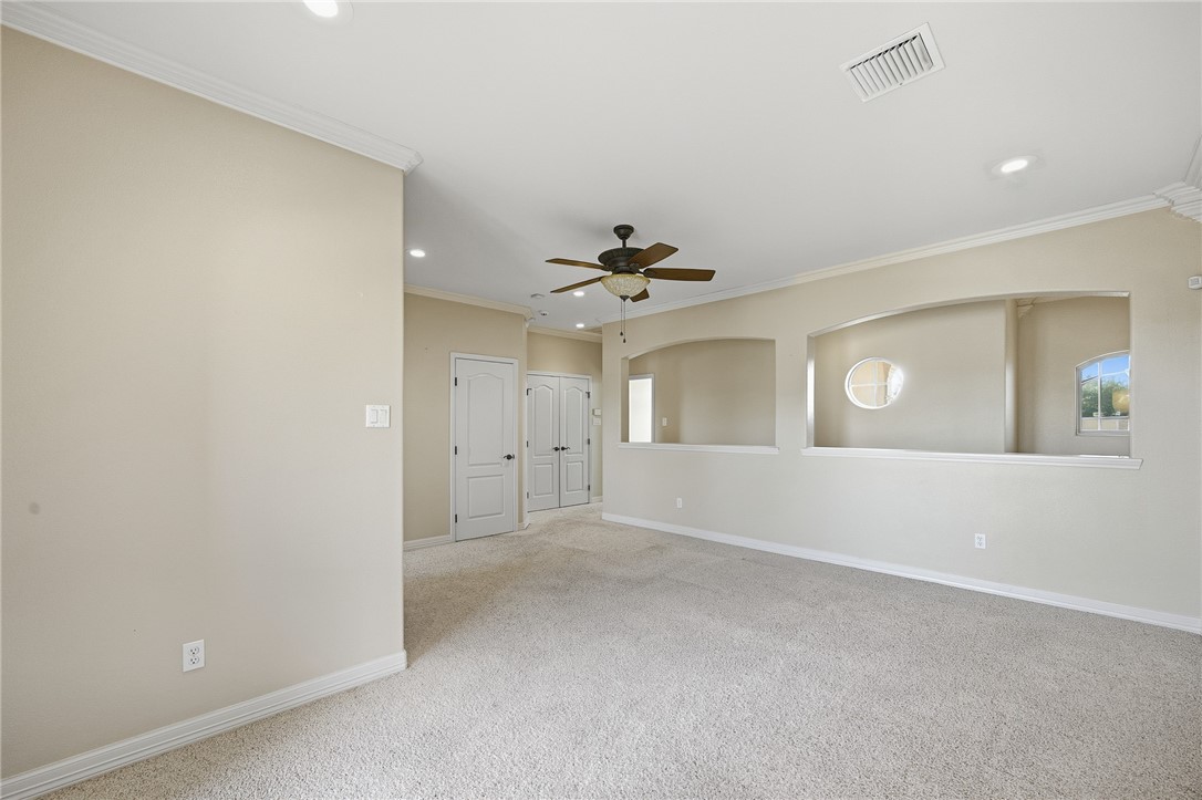 6934 Wooldridge Road, Unit R5 Corpus Christi, TX 78414 - Photo 19 of 32 a view of an empty room