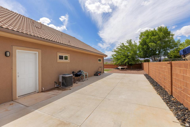 225 Falcon Court Ivins, UT 84738 - Photo 31 of 47 Fenced backyard featuring a patio area