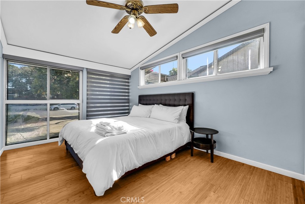 645 South Trident Street Anaheim, CA 92804 - Photo 15 of 30 a bedroom with a bed and large window